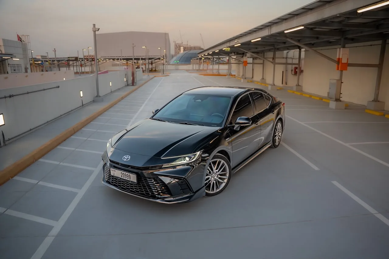 Toyota Camry 2025 — Black / Red Interior — photo 2